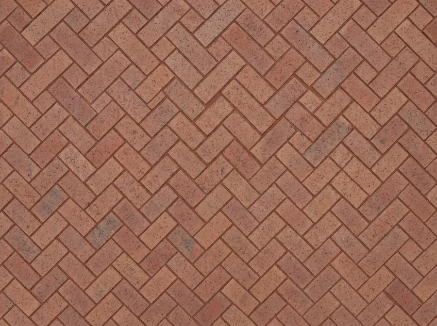 Red clay pavers laid in 45 degree herringbone, seen from above